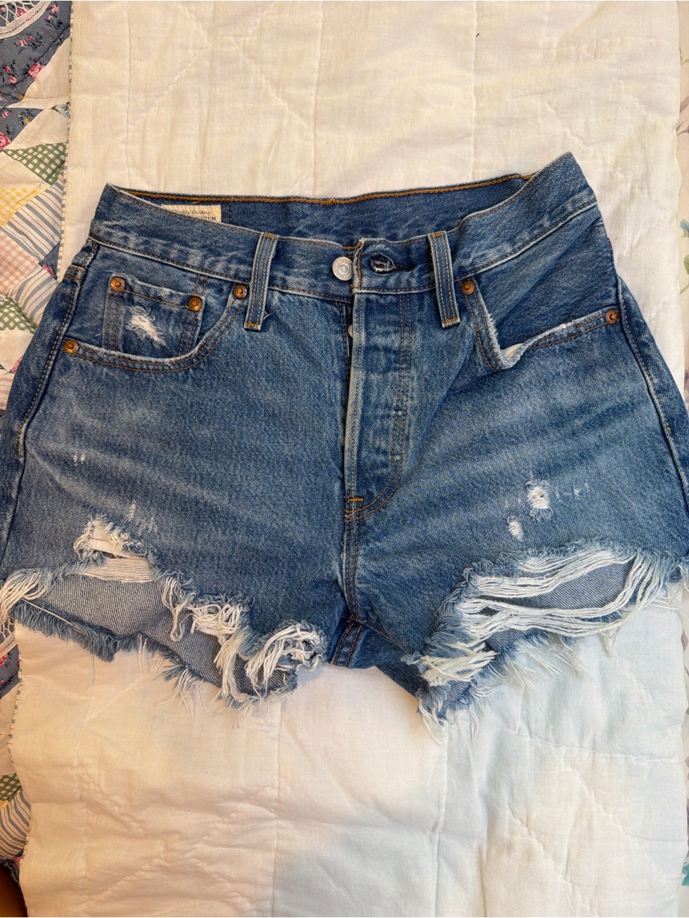 Levi's Medium Blue Distressed High-Rise Cutoff Shorts